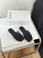 Petal Anagram Slide in Black Soft Calfskin 273512