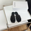 Petal Anagram Slide in Black Soft Calfskin 273512