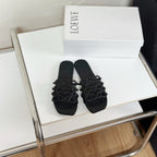 Petal Anagram Slide in Black Soft Calfskin 273512
