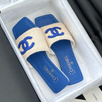 WOVEN SLIDE IN RAFFIA AND CERULEAN BLUE LAMBSKIN