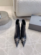 POINTED-TOE HIGH HEEL BOOTS IN BLACK SMOOTH LAMBSKIN