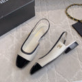 CC Cap Toe Slingback Black White Lambskin 404284