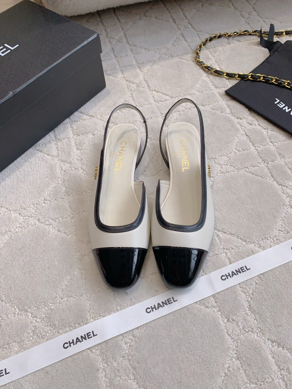 CC Cap Toe Slingback Black White Lambskin 404284
