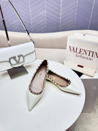ROCKSTUD FLAT PUMP IN WHITE CALFSKIN