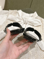 CAGOLE FLAT SANDALS IN BLACK WAX-OIL SHEEPSKIN