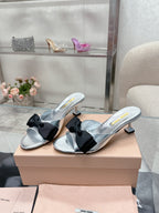 Miu Mordoré Black Bows Mules 50mm Sliver Cowhide 445519