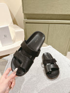 The Row Hugh Slides Black Cowhide Rubber 451281