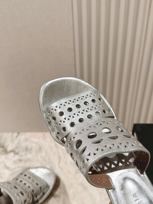 Alaia 2025 Vienne Cutout Kitten-Heel Slide Sandals Silver Leather 293647