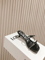 Loewe 25 Petal Bow Sandals Black Cowhide PVC