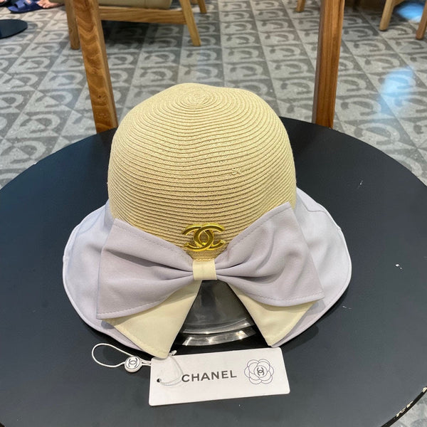 BOW BUCKET HAT IN PALE PURPLE MIX BEIGE RAFFIA 426169