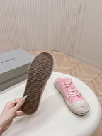 SNEAKER MULES IN PINK CANVAS GRAFFITI LOGO