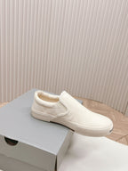 SLIP-ON SNEAKERS GRAFFITI IN WHITE CANVAS