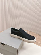 SLIP-ON SNEAKERS GRAFFITI IN BLACK CANVAS