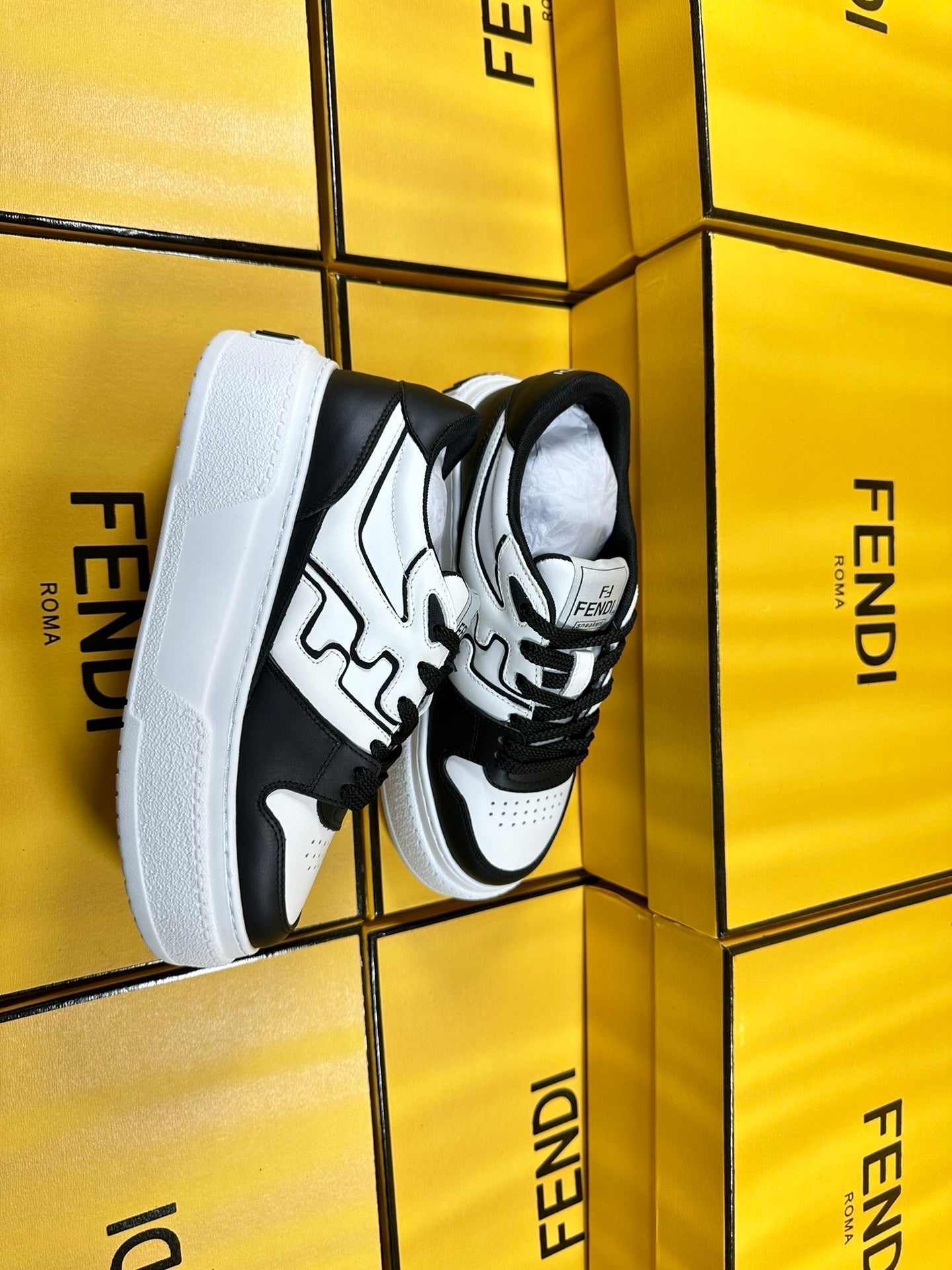 FENDI THICK- ED SNEAKER IN WHITE AND BLACK LAMBSKIN