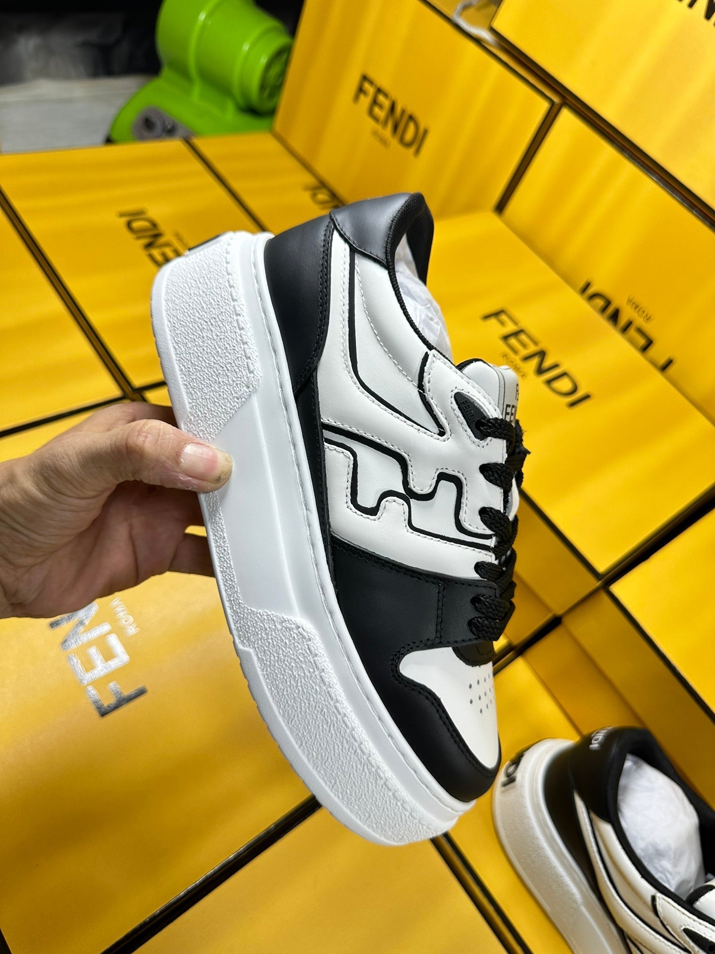 FENDI THICK- ED SNEAKER IN WHITE AND BLACK LAMBSKIN