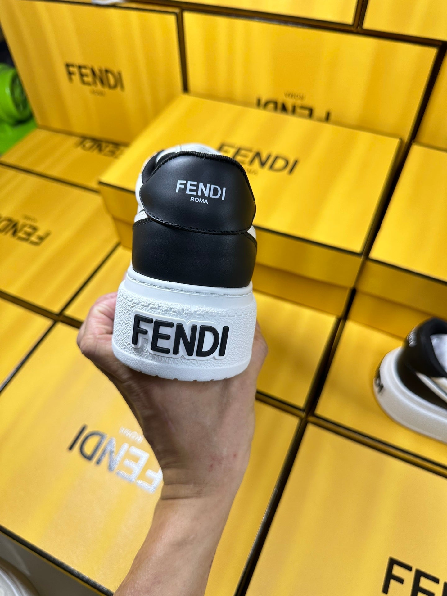FENDI THICK- ED SNEAKER IN WHITE AND BLACK LAMBSKIN