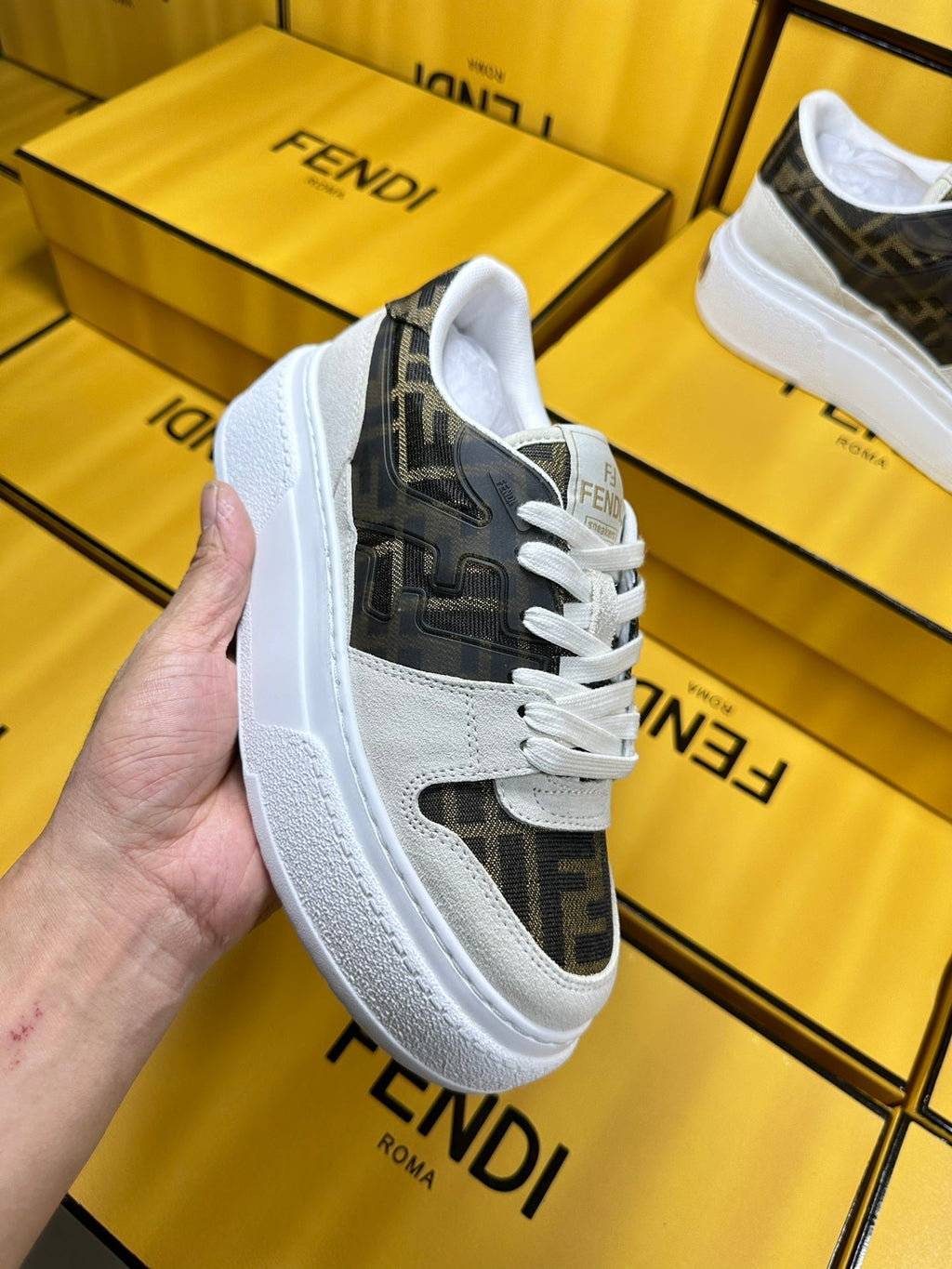 FENDI THICK- ED SNEAKER IN WHITE SUEDE AND BROWN MONOGRAM FABRIC