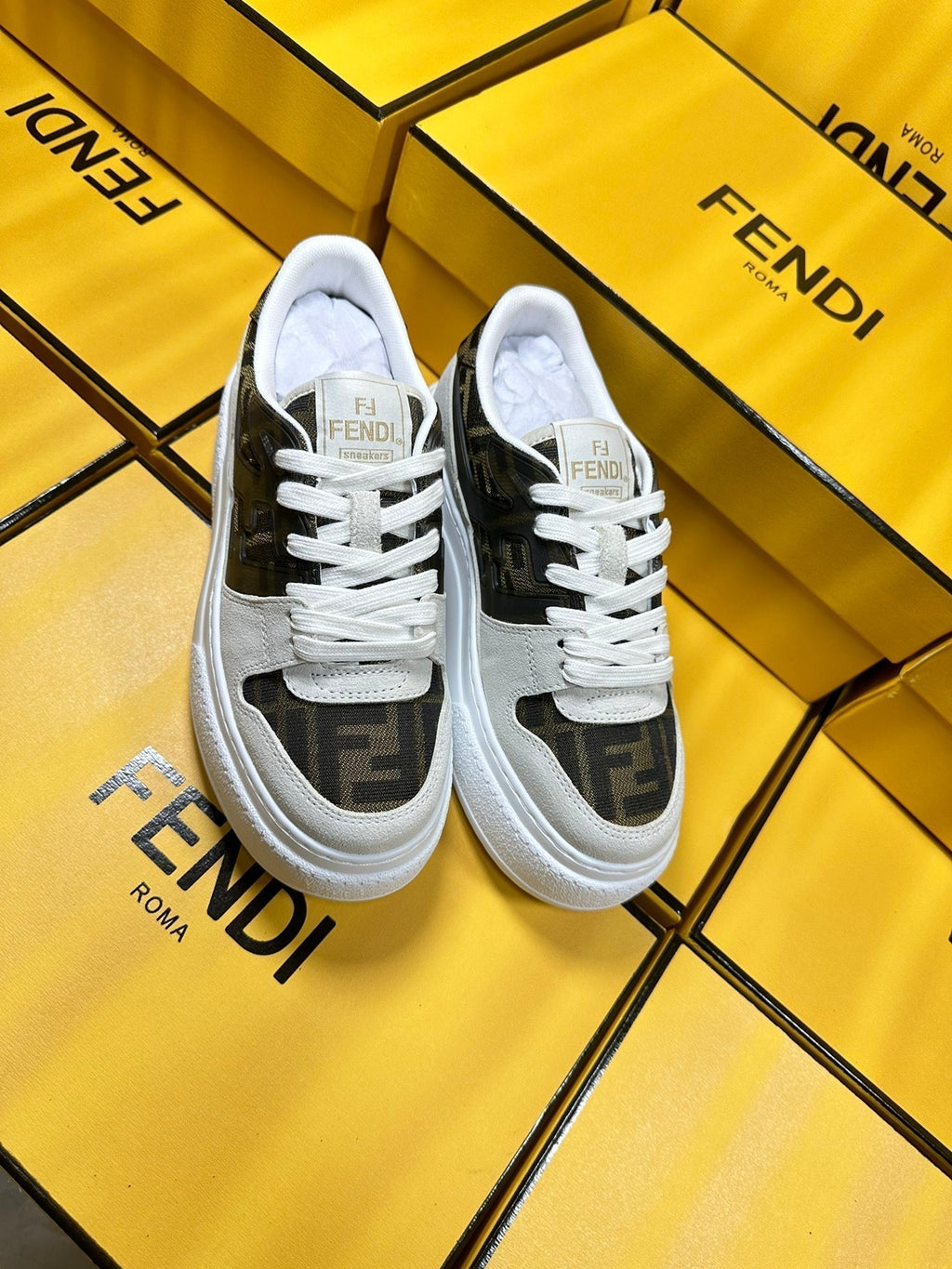FENDI THICK- ED SNEAKER IN WHITE SUEDE AND BROWN MONOGRAM FABRIC