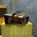 HIGH WEDGE PLATFORM IN BLACK CALFSKIN WITH GOLD HARDWARE