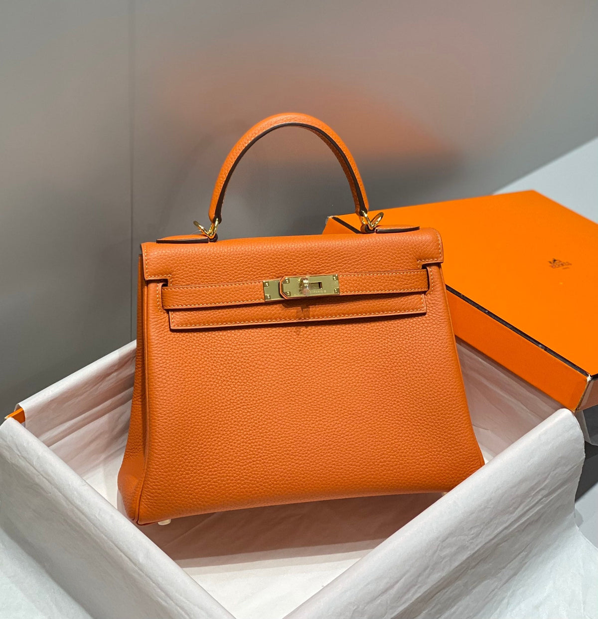 HM KELLY 28CM ORANGE TOGO GOLD HARDWARE