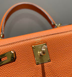 HM KELLY 28CM ORANGE TOGO GOLD HARDWARE