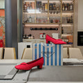 TRIANGLE LOGO PUMPS IN RED SATIN