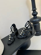 CC 25SS Camellia Multi Straps Heel Sandal 60mm Black Sheepskin 351434