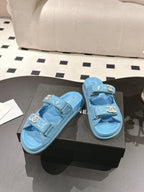cc 25p logo with pearl mule sandal blue leather 237583