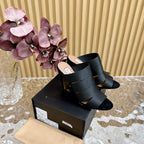 ALAIA ELASTIC CAGE MULE SANDALS IN BLACK WOVEN STRAP AND LAMBSKIN