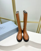 KNEE BOOTS WITH TRIANGLE LOGO IN CAMEL CALFSKIN