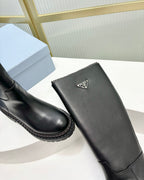 KNEE BOOTS WITH TRIANGLE LOGO IN BLACK CALFSKIN