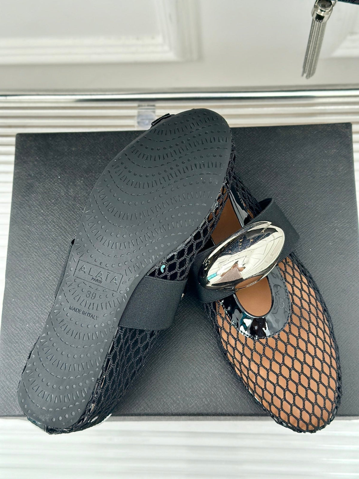 ALAIA MARY JANE SHOES IN BLACK MESH WITH SILVER HARDWARE