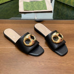 FLAT MULE IN BLACK CALFSKIN