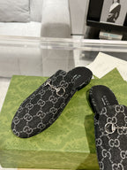 MEN'S MULE WITH HORSEBIT IN BLACK MONOGRAM JACQUARD FABRIC