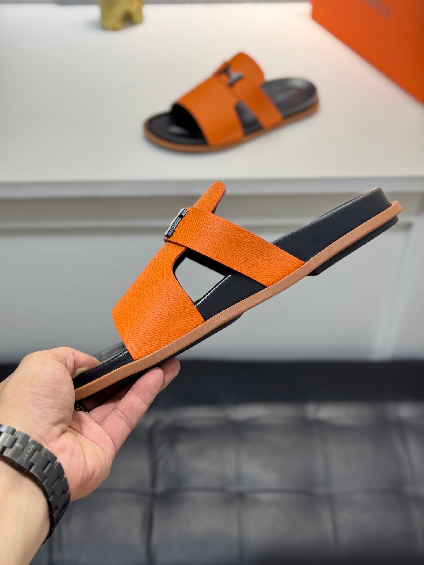 HM Oran H Noir Buckle Slippers in Orange Cowhide 735259