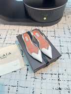 ALAIA FLAT SLINGBACK IN WHITE PATENT CALFSKIN AND FILM