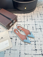 ALAIA FLAT SLINGBACK IN LIGHT BLUE PATENT CALFSKIN AND FILM