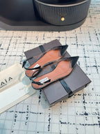 ALAIA FLAT SLINGBACK IN BLACK PATENT CALFSKIN AND FILM