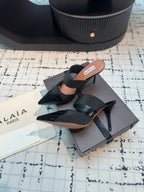ALAIA HIGH HEEL 9 CM IN BLACK CALFSKIN