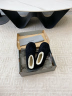 FLAT ANKLE BOOTS IN BLACK SUEDE AND SHEARLING LINING
