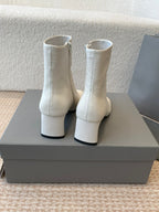 ANKLE BOOTS IN WHITE LOGO EMBOSSED SOFT SHEEPSKIN