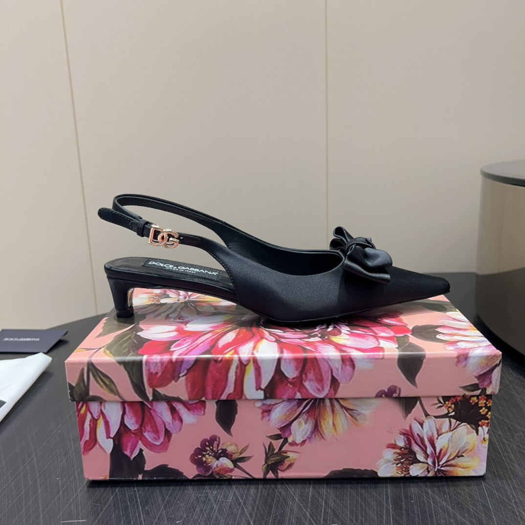 DC 25 Bow Slingback Pumps Black Silk And Sheepskin 381616