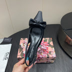 DC 25 Bow Slingback Pumps Black Silk And Sheepskin 381616