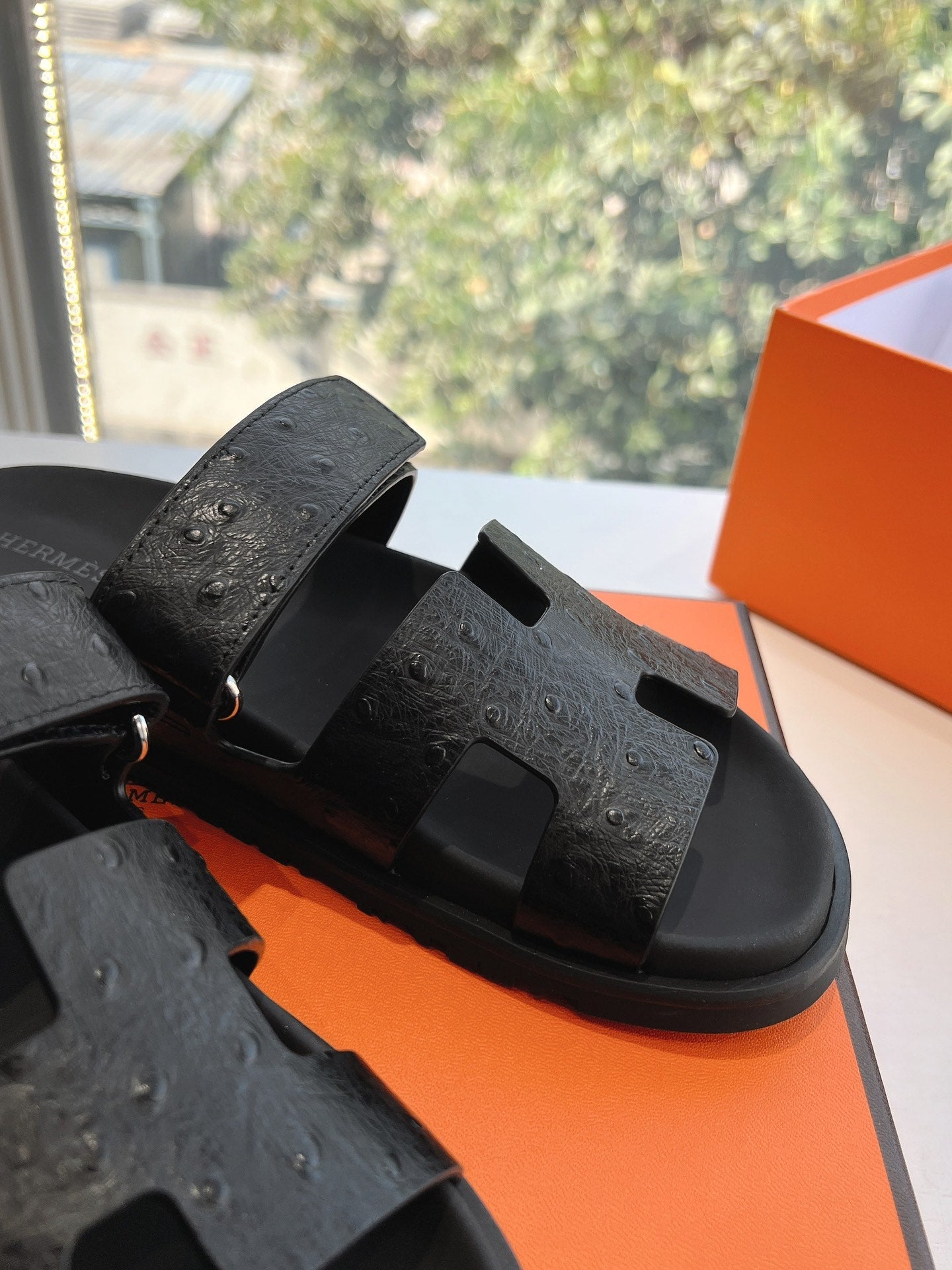 HM Chypre Sandal Black Ostrich Leather 202800