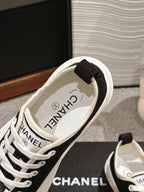 LACE-UP SNEAKERS IN BLACK CANVAS