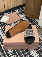 Miu 25S Beige and Black Canvas and leather slides 227133