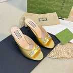 GG  Women's Horsebit mid-heel slide sandal in Gold