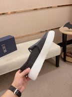CD B23 SLIP ON BLACK CALFSKIN AND JACQUARD