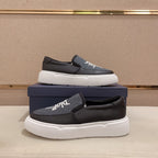 CD B23 SLIP ON BLACK CALFSKIN AND JACQUARD