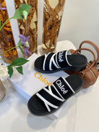 CHLOÉ WOODY WEDGE SANDALS IN BLACK MIX WHITE CANVAS WITH RUBBER SOLE